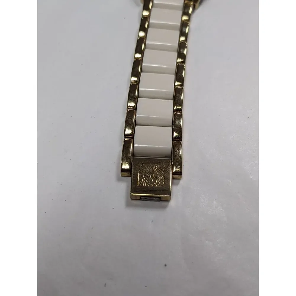 Anne Klein Two Tone White and Golden Sectioned Wrist Watch Roman Numeral